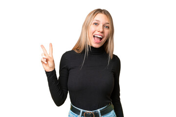 Wall Mural - Young pretty blonde woman over isolated chroma key background smiling and showing victory sign