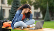 © Prostock-studio - Tired unhappy pretty young indian woman student looking at laptop