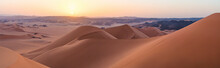 Aerial View Of Sand Dunes At Sunset In The Sahara Desert, Djanet, Algeria, Africa.
