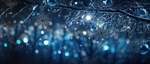 Christmas Midnight Shimmer. A Detailed Shot Capturing The Sparkling Silver And Blue Decorations On A Christmas Tree, Reminiscent Of A Starry Night. Merry Christmas Card. 