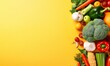 Fresh vegetables on yellow background.