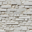Seamless grunge texture of white brick wall