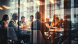 © Malambo/Peopleimages - AI - Group of business people having a meeting or brainstorming in a boardroom