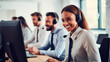 © serperm73 - Call center workers. Men and women with headphones and microphone headset.