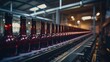 Red wine bottles on the conveyor belts in factory production.