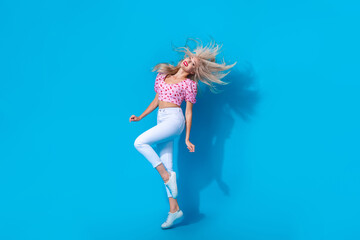 Sticker - Full body photo of pretty young girl energetic dancing have fun wear trendy pink cherry print outfit isolated on blue color background