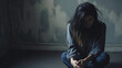 © The Stock Photo Girl - person sitting on the floor with depression