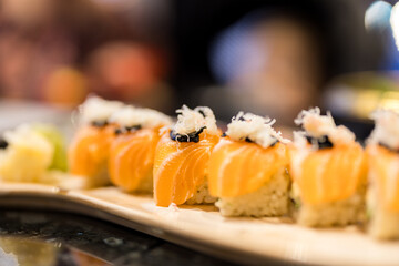 Canvas Print - Salmon maki roll dish in Japanese restaurant