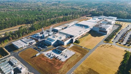 Poster - Aerial view of new big factory complex for producing and shipping of industrial equipment. Global manufacture concept