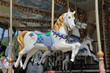 Colorful horses as part of a vintage merry-go-round