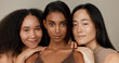 © N Felix/peopleimages.com - Women, underwear and beauty of diversity friends in studio for portrait, inclusion or wellness. Model people hug on neutral background as different body care, skin glow or natural cosmetic comparison