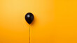 Black balloon with yellow background. Black Friday and Cyber Monday. 