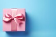 Blue gift box with ribbon on pink background. Holiday concept for various occasions. Copy space available. Minimal banner. Generative AI