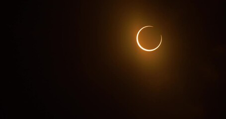 Wall Mural - Timelapse of an annular solar eclipse moments before entering totality, October 14th, 2023