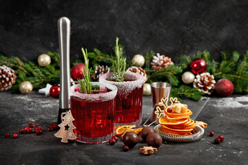 Wall Mural - Red christmas cocktail with cranberries in a glasses.