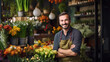 © PaulShlykov - Small business. Male florist unfocused in flower shop. Floral design studio, making decorations and arrangements. Flowers delivery, creating order