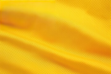 Yellow color football jersey clothing fabric texture sports wear background, close up.