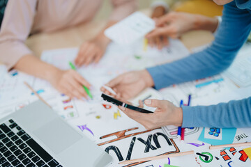 Wall Mural - Team of Creative Web, Graphic Designer planning for mobile phone, drawing website ux ui app for mobile phone application and development template layout, process to developing prototype wireframe.