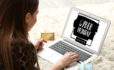 Sticker - Young woman with credit card shopping online at home. Cyber Monday Sale