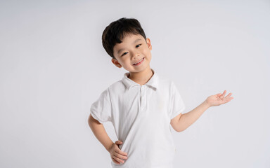 Portrait of asian boy posing on white background