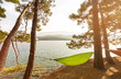 Hammock between pine trees in scenic bay (Osor) on the island of Losinj in the Adriatic Sea, Croatia
