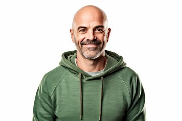 Wall Mural - Bald man with a green hoodie smiling over white background.