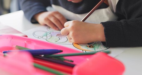 Poster - Creativity, school and hands of child drawing in a classroom for art lesson for education and development in class. Closeup, kindergarten and kid or student learning artistic homework on a desk