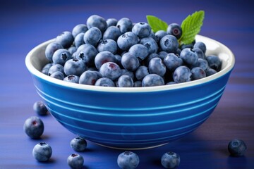 Sticker - freshly washed blueberries in a blue bowl