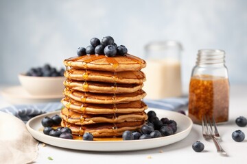 Poster - stack of vegan pancakes with maple syrup and blueberries