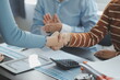 © Sirikarn Rinruesee - Business handshake for teamwork of business merger and acquisition,successful negotiate,hand shake,two businessman shake hand with partner to celebration partnership and business deal concept
