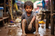 Indian little child covered in mud