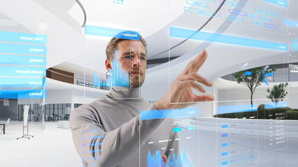 Poster - Handsome Man Standing in Futuristic Virtual Space, Interacting with an Augmented Reality Hologram with Business Data, Financial Reports, Stock Market Statistics, Infographics and Charts