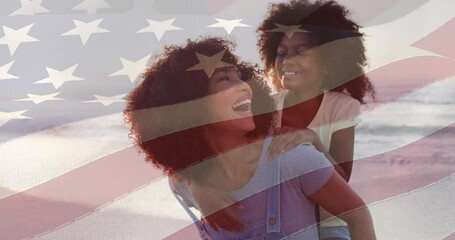 Canvas Print - Animation of flag of usa over happy african american mother with daughter on beach