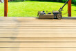 Machine cleaning of a wooden terrace - dry method - grinding the boards with sanding machine, preparing for oiling the terrace