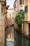 Fototapeta Uliczki - Canal in Venice, Italy. Venice is the capital and most populous city of Italy.