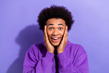 Wall Mural - Photo of young guy unexpected reaction hands cheeks speechless staring how great carpathian mountains view isolated on violet background