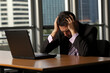 © Konstiantyn Zap - Stressed man in the office, his face reflecting tension. Tight deadlines, office strain