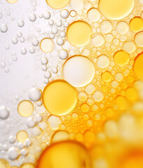 Close-up of oily facial serum drop with bubbles.