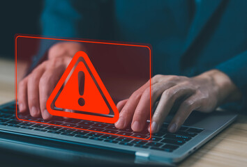 Wall Mural - laptop shows warning sign cyber error caution danger concept