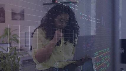 Poster - Animation of stock market data processing on thoughtful biracial woman woman using laptop at office