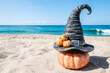 Halloween beach background with witch hat pumpkins