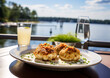 crab cakes served simply in a fine setting along a waterside