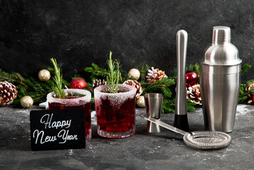 Wall Mural - Red christmas cocktail with cranberries in a glasses.