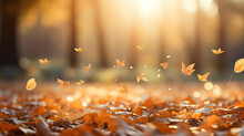 Falling Autumn Leaves With A Blurred Background