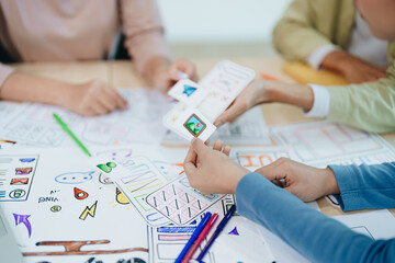 Wall Mural - Team of Creative Web, Graphic Designer planning for mobile phone, drawing website ux ui app for mobile phone application and development template layout, process to developing prototype wireframe.