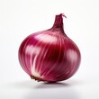 Red onion with its papery skin on white background