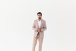 © SHOTPRIME STUDIO - man running beige happy winner professional victory business smiling businessman suit