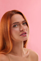 Wall Mural - Portrait of beautiful young woman on pink background, closeup