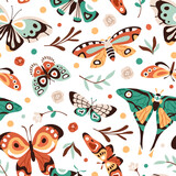 Fototapeta Psy - Butterflies, seamless pattern design. Summer nature, endless background, repeating print. Beautiful moths flying, flowers, leaf plants, printable texture for fabric, textile. Flat vector illustration