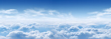 Panorama Of Blue Sky And Soft White Cumulus Clouds In The Summer Sun As A Background. Copy Space